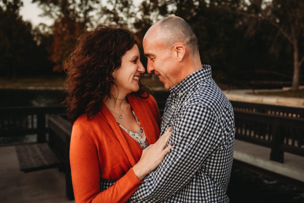 Husband and wife looking at each other during a family photography session