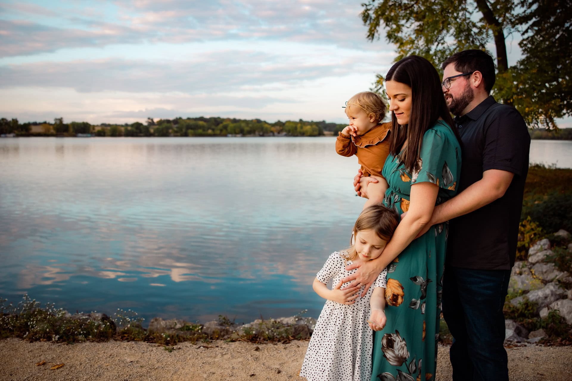Family of 4 by the lake
