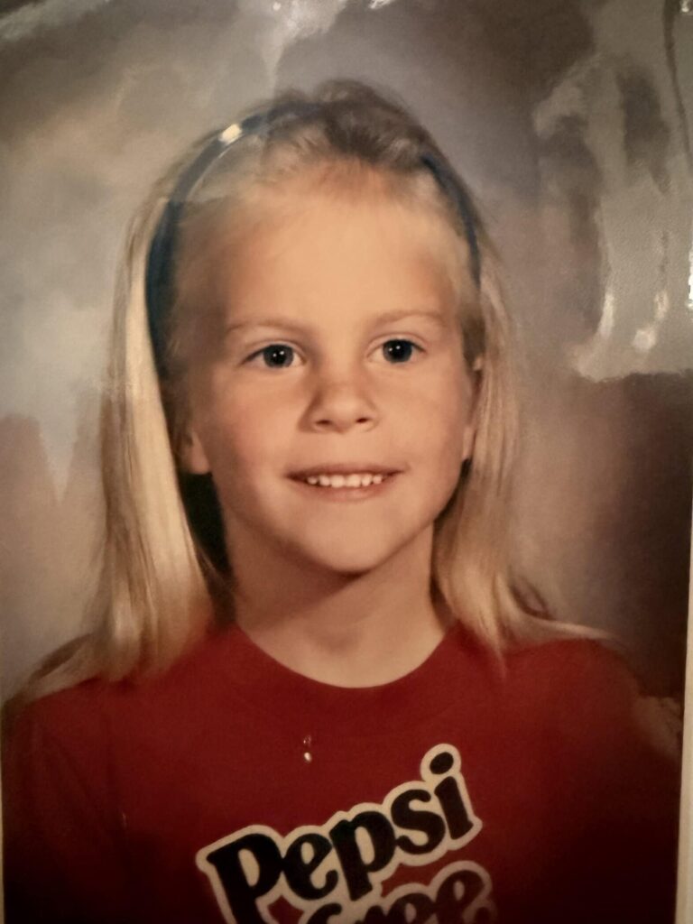 Should I wear my hair down for family photos? Adorable six year old wearing Pepsi Free t-shirt