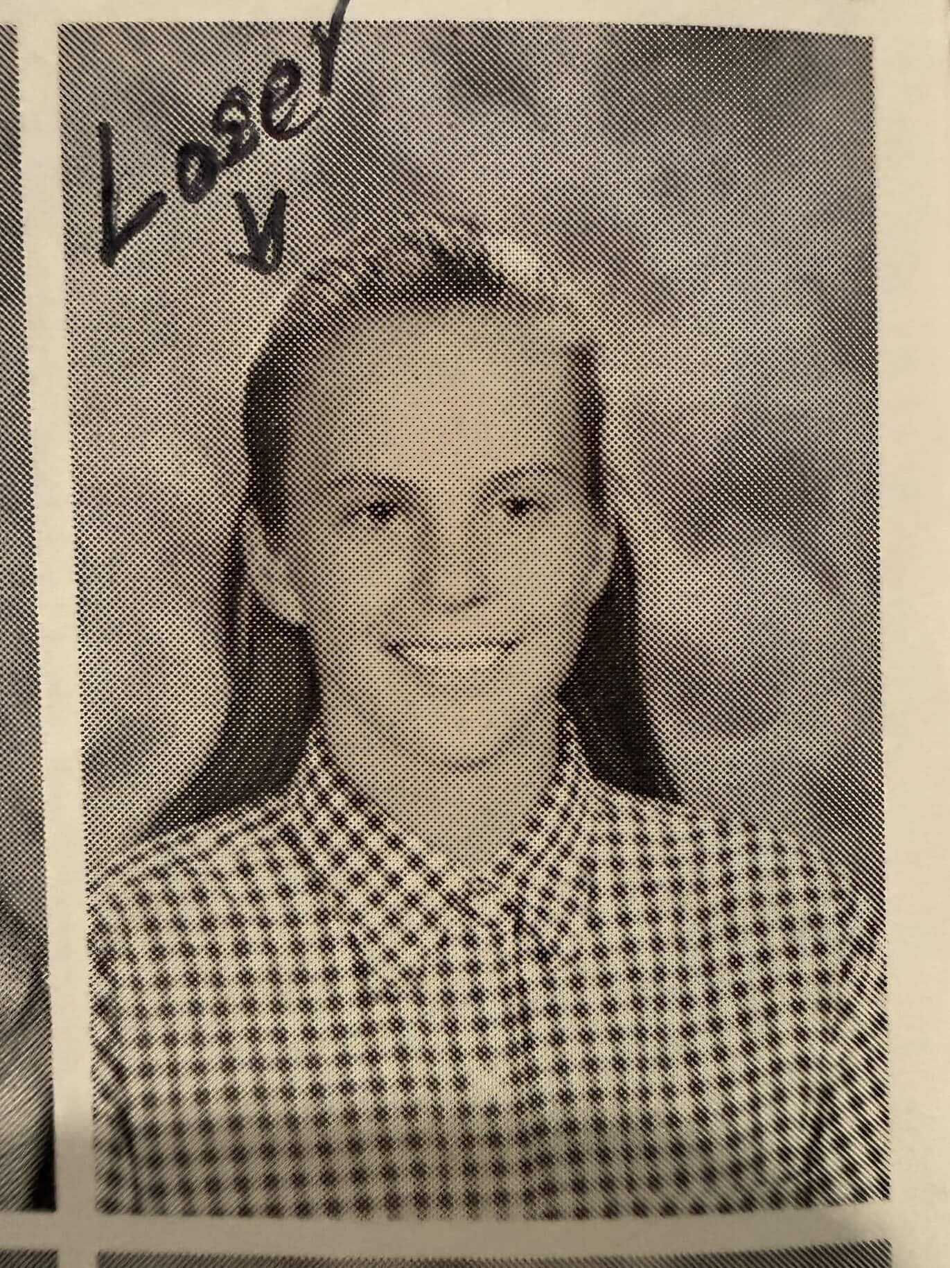 Should I wear my hair down for family photos? Awkward teenager girl with peeled onion hairstyle.