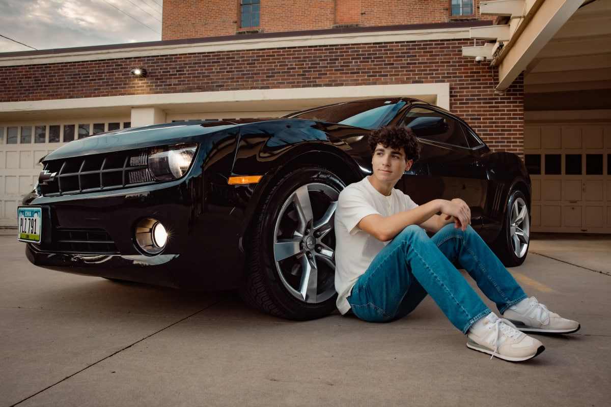 Senior Pictures · Senior Photographer for North Liberty, Coralville, Iowa City, and Cedar Rapids, Iowa · Unique Senior Photographer Senior boy with black Camaro car